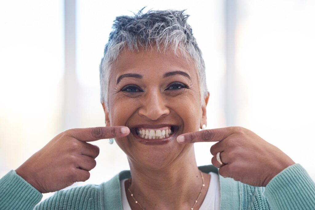 Senior woman smile hands teeth wellness happy healthy cleaning care elderly person happiness portrait dental healthcare cosmetic facial care tooth whitening oral hygiene 590464 113537 Senior woman smile hands teeth wellness happy healthy cleaning care elderly person happiness portrait dental healthcare cosmetic facial care tooth whitening oral hygiene 590464 113537